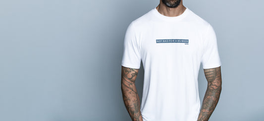 Tall slim man wearing tall tee by Navas Lab Apparel