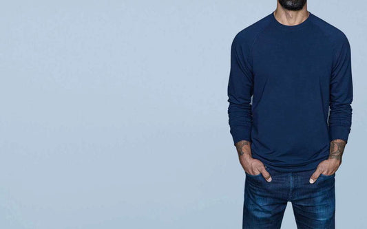 Skinny tall guy in the Navas Lab Billy tall sweatshirt in blue