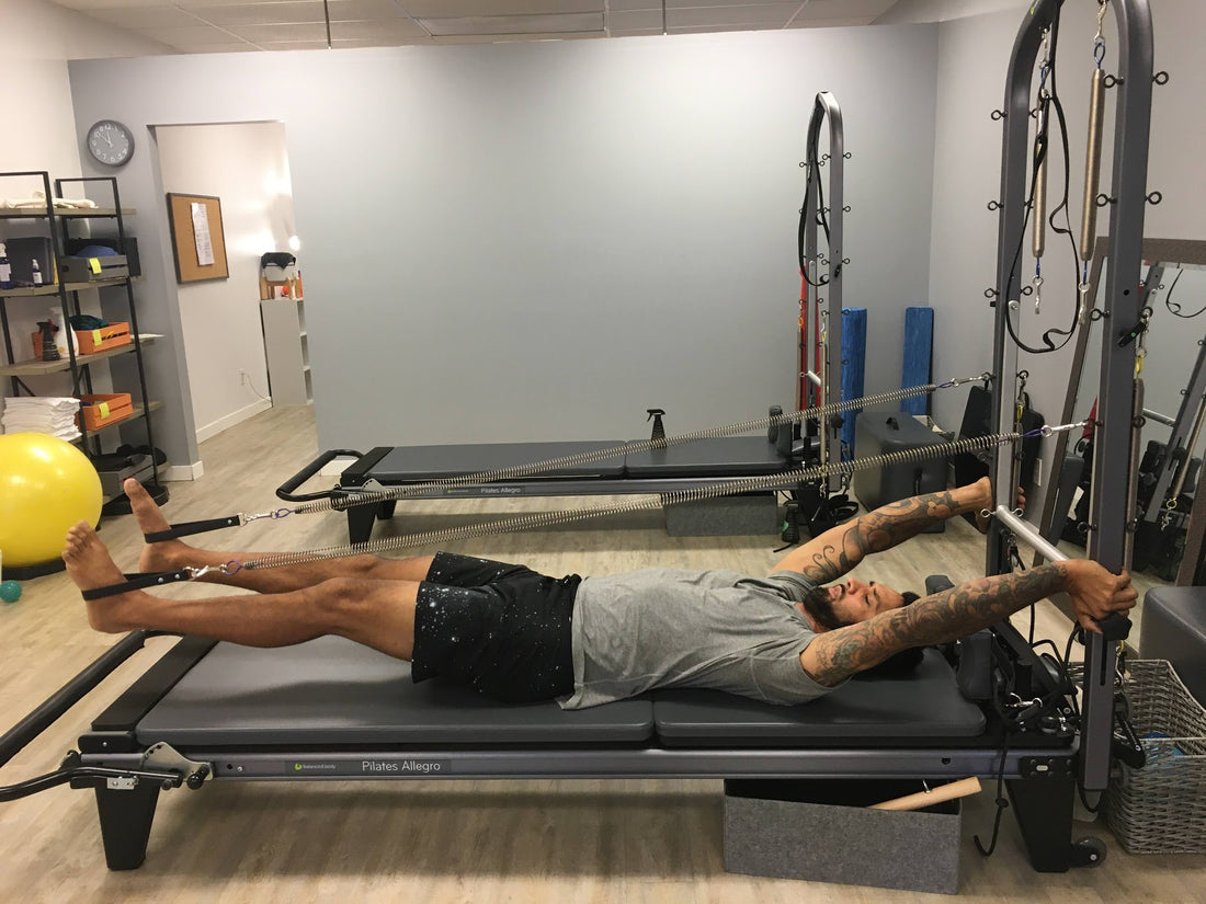 Tall guy doing pilates wearing mens tall clothing by Navas Lab Apparel