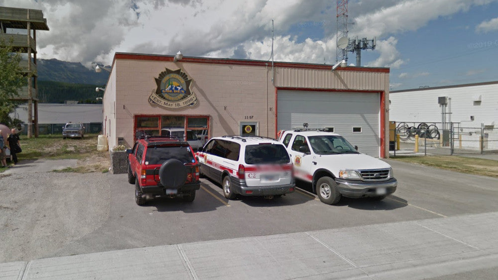 fire hall in golden BC with 3 trucks out front