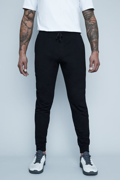 Mens tall joggers for tall guys in black by Navas Lab. The perfect mens tall athletic pants for tall and slim guys looking for style and comfort.