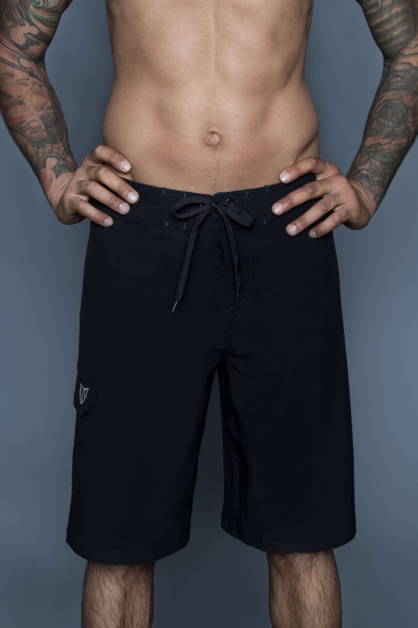 The Navas Lab Zod boardshorts for tall guys in black. The perfect boardshorts for tall men.