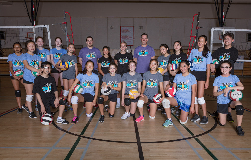 youth volleyball team in gymnasium