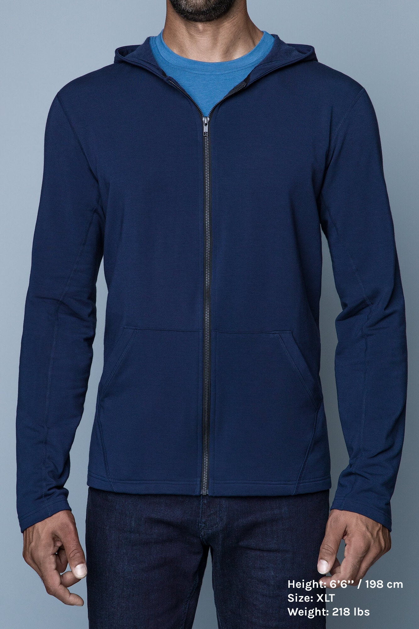 The Navas Lab Hawkins tall hoodie in blue. This perfect tall slim hoodie for tall and slim guys looking for style and comfort. Tall skinny guy sweater hoodie in blue.