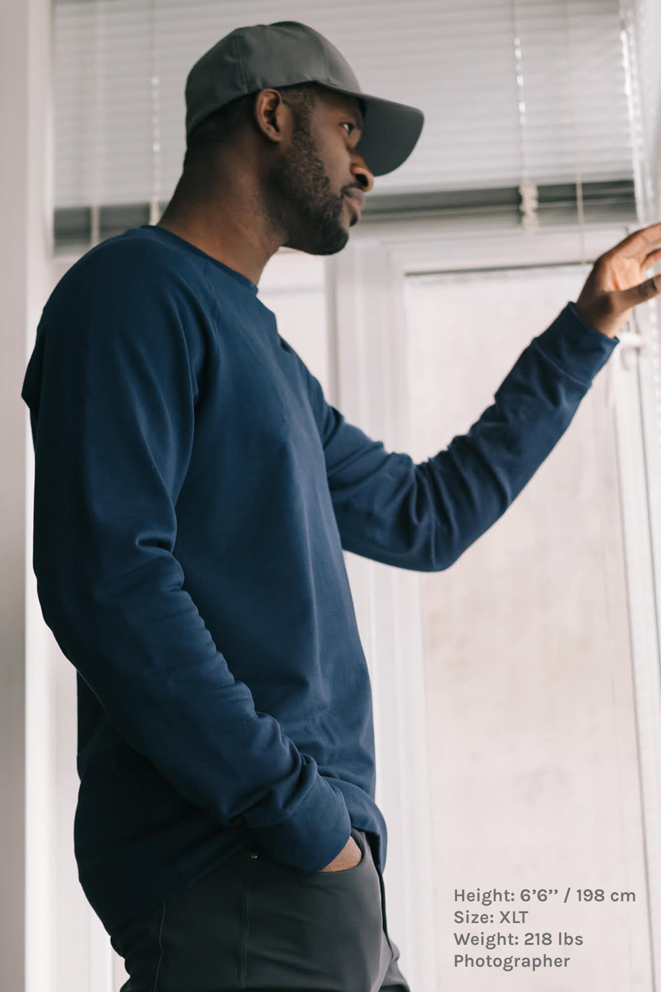 Tall Skinny Man Wearing the Billy Men's Tall Sweatshirt in Blue by Navas Lab Apparel